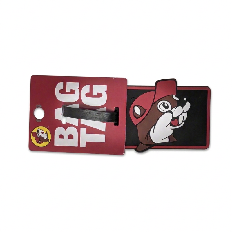 Buc-ee's rectangular bag tag in black with a red border and Buc-ee the Beaver popping over the top edge, with strap
