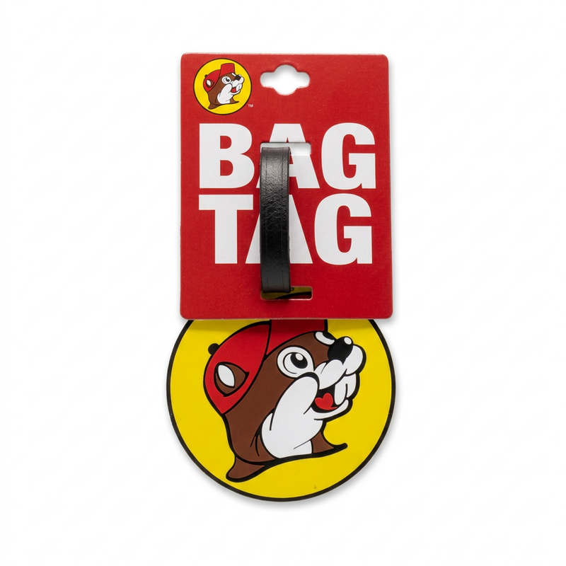 Buc-ee's round yellow bag tag shaped like the Buc-ee the Beaver logo, with a black strap on its red Bag Tag card