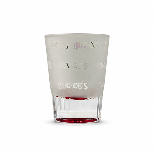 Frosted Buc-ee's Bastrop shot glass with etched repeating logo pattern and red base, back view