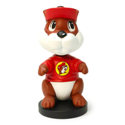 Front view of the Buc-ee’s beaver bobblehead showing its smiling face, buck teeth and the logo centered on its red shirt