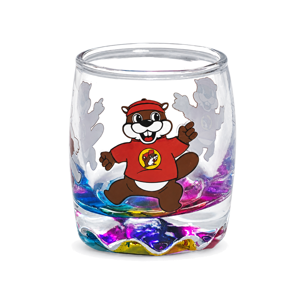 Buc-ee's souvenir glass with the beaver mascot in a red shirt, frosted beaver outlines, and a swirled rainbow glass base