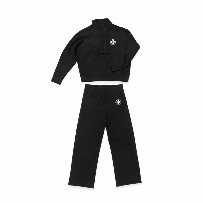 Buc-ee's black fleece set with a cropped quarter-zip pullover and wide-leg drawstring pants, each with a beaver logo patch