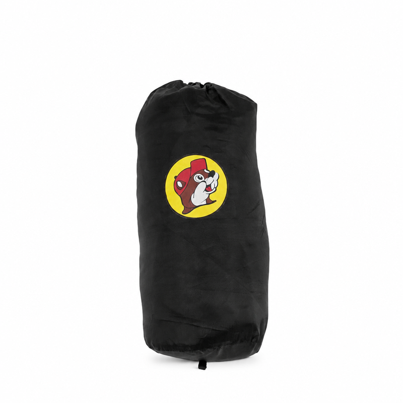 Black Buc-ee's Puffy Packable Winter Coat packed into its matching black drawstring storage bag with yellow beaver logo