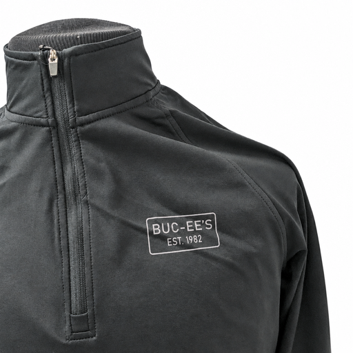 Buc-ee's black quarter-zip pullover chest detail with light gray EST. 1982 rectangle logo, metal zipper pull, and stand collar