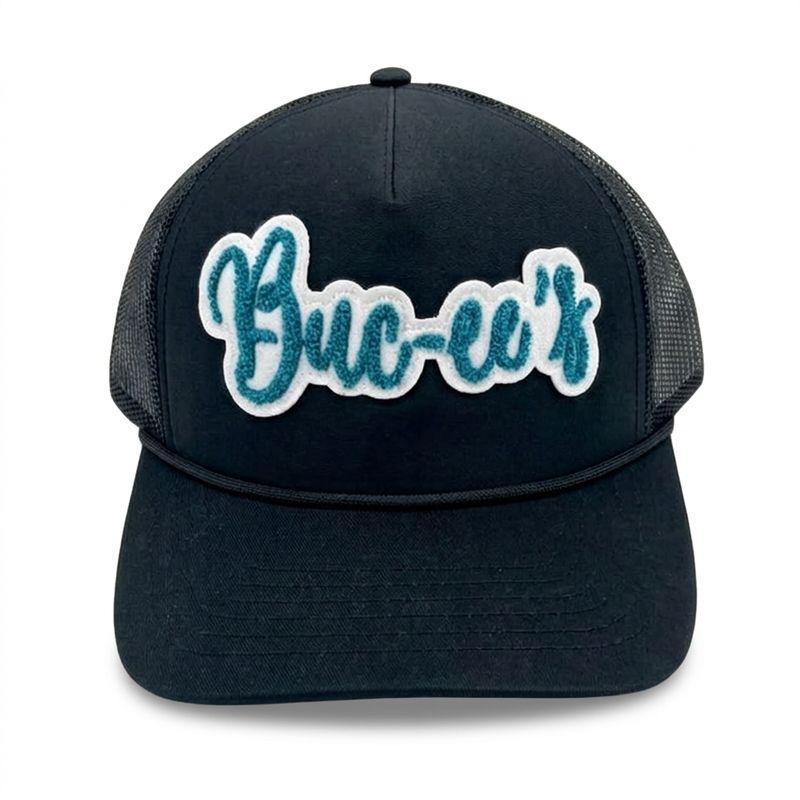 Front of Buc-ee’s black trucker hat with a teal chenille script logo patch, rope detail, and black mesh side panels