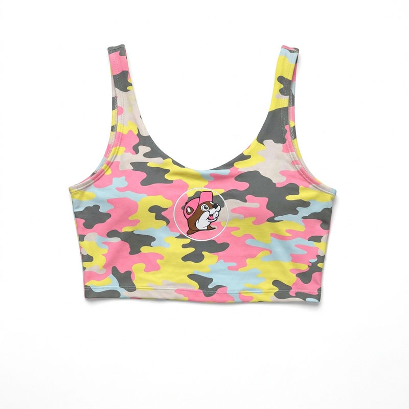 Buc-ee’s Camo athletic crop top in pink, yellow, and gray camouflage with scoop neck and pink-cap beaver logo