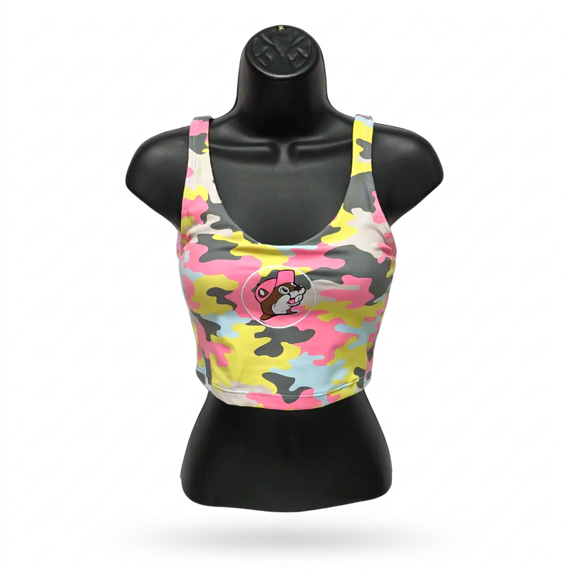 Buc-ee’s pastel camo athletic crop top on a black mannequin, showing the cropped fit and scoop neckline
