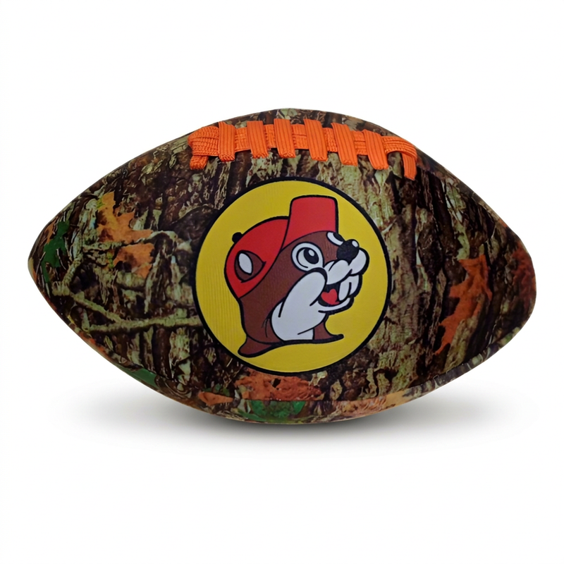 Buc-ee’s Camo Football with a woodland tree camouflage print, orange laces, and the beaver logo in a yellow circle