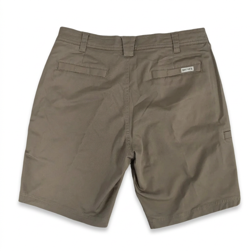 Back of the Buc-ee’s Caribou fishing twill shorts, showing two welt back pockets and a small white brand tag on the right pocket