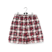 Red, green and white plaid flannel Christmas shorts with elastic waist and in Santa hats, front view