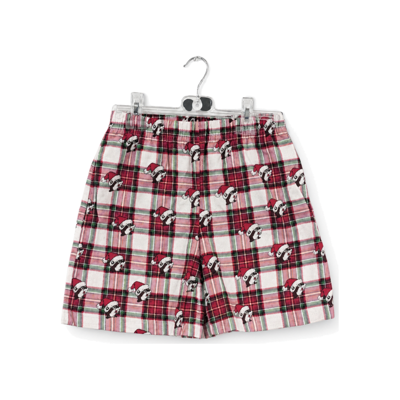 Red, green and white plaid flannel Christmas shorts with elastic waist and in Santa hats, front view