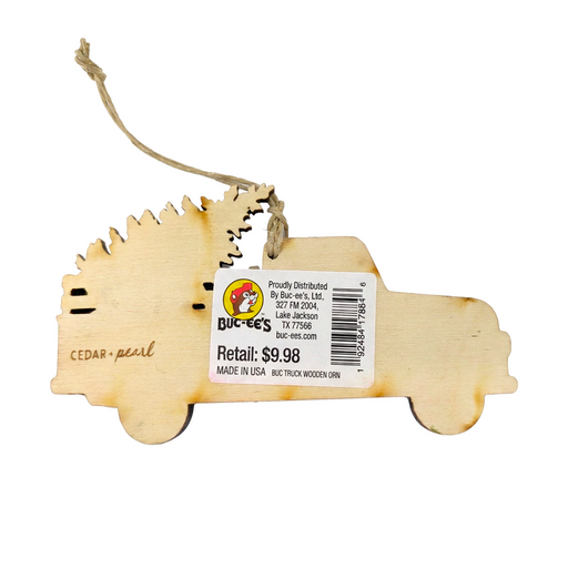 Buc-ee’s Christmas Red Truck Wooden Ornament back, showing natural unpainted wood, a twine hanger, and a Made in USA tag