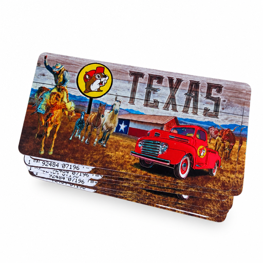 Buc-ee's collectible Texas license plate magnet with a red pickup truck, cowboy on bronco, horses, longhorns, and Texas barn