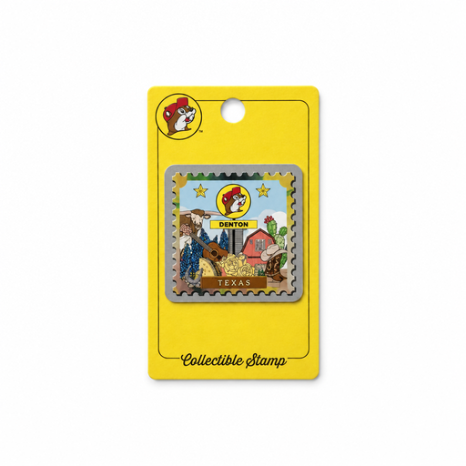 A postage-stamp-style souvenir with perforated metallic silver edges on a yellow packaging card. The stamp artwork includes a Buc-ee's Denton sign, Texas Longhorn, armadillo, acoustic guitar, red barn, bluebonnets, and cowboy boot, with "TEXAS" printed at the bottom.
