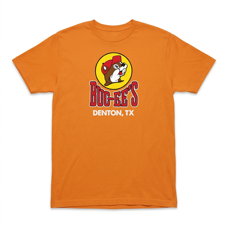 Buc-ee’s orange Denton, Texas location t-shirt with the yellow beaver logo, red wordmark, and “Denton, TX”