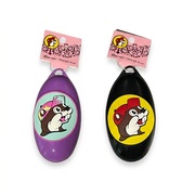 Buc-ee’s detangler brushes in two colors: purple with a tie-dye cap beaver and black with the classic yellow beaver logo