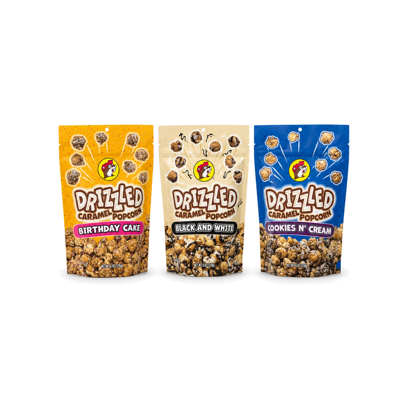 Three bags of Buc-ee's Drizzled Caramel Popcorn: Birthday Cake, Black and White, Cookies N' Cream