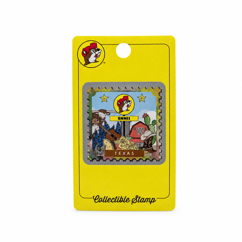 Buc-ee's Ennis Texas collectible stamp with longhorn, bluebonnets, guitar, red barn, and cowboy boot on yellow backing card