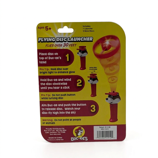 Buc-ee’s Flying Disc Launcher package back with 3-step wind-up instructions, a do-not-point warning, and contents list