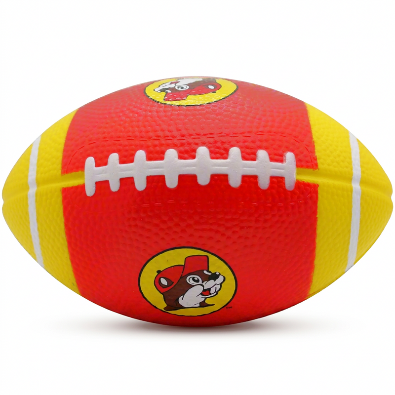 Buc-ee’s red and yellow foam football with white laces and stripes, a pebbled texture and two beaver logos