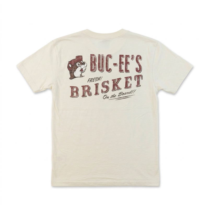 Back of Buc-ee’s Fresh Brisket on the Board shirt in cream with distressed maroon lettering and beaver logo