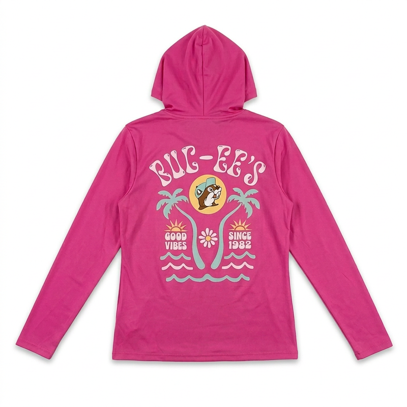 Buc-ee’s fuchsia performance hoodie with a retro beach graphic of palm trees, waves, and “Good Vibes Since 1982”