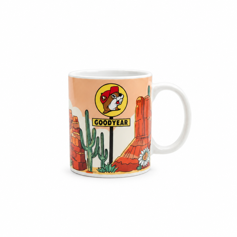 Buc-ee's Goodyear Arizona mini mug in white ceramic with beaver logo sign, saguaro cacti, and red rock desert scene
