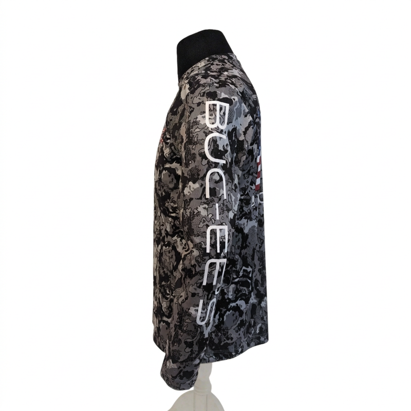 Side view of the gray camo performance long sleeve shirt with white BUC-EE’S lettering printed down the sleeve