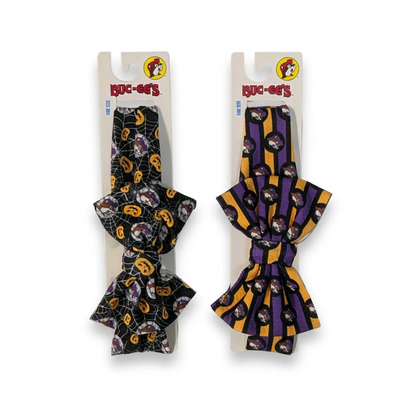 Buc-ee’s Halloween bow headbands, one size, in black jack-o’-lantern spiderweb print and purple and orange stripes