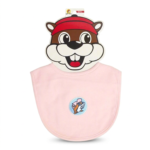 Buc-ee's infant bib in solid pink with a Buc-ee the Beaver patch on a blue circle, on a Buc-ee card