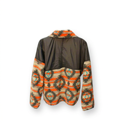 Back of the Buc-ee’s ladies’ Berber Aztec fleece jacket, with a charcoal nylon yoke across the shoulders and patterned fleece below