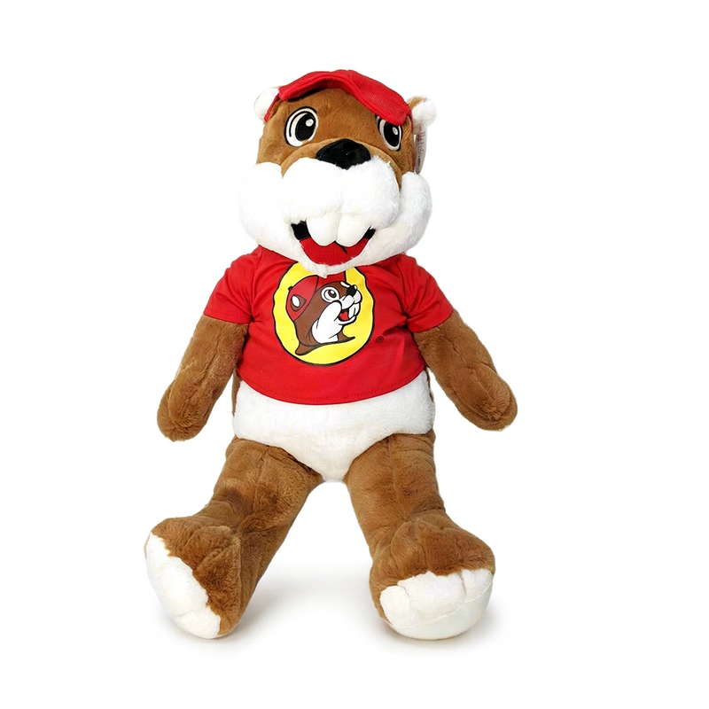Buc-ee’s large stuffed beaver plush in a red baseball cap and red logo T-shirt, sitting with legs out