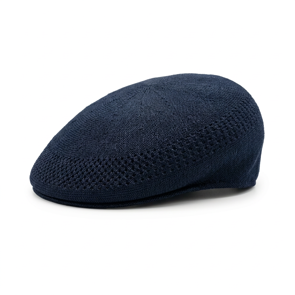 Buc-ee’s navy blue knit driver hat with an open-weave vented band around the crown and a short front brim