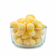 Buc-ee’s Nug-ees White Cheddar Habanero baked corn puffs in a clear glass bowl, showing their pepper-flecked texture up close