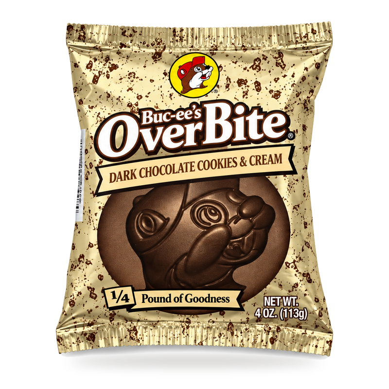 Buc-ee’s OverBite Dark Chocolate Cookies & Cream, a 4 oz beaver-shaped candy in a cream foil wrapper with brown speckles