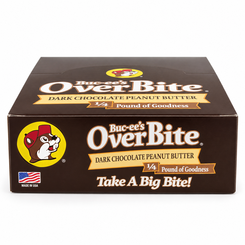Buc-ee's OverBite Dark Chocolate Peanut Butter 12-count box shown straight on against a white background, with the dark brown box, yellow beaver logo, "1/4 Pound of Goodness" banner and "Take A Big Bite!" slogan.
