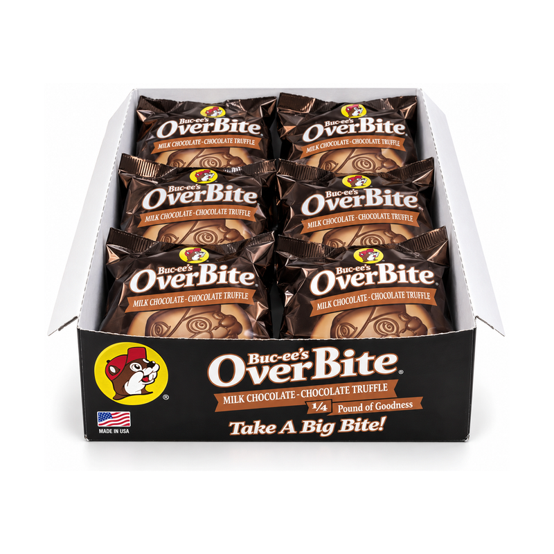 Open Buc-ee's OverBite Milk Chocolate - Chocolate Truffle 12-count box shown straight on against a white background, with the black front panel and six individually wrapped cookies in glossy dark brown wrappers visible inside.
