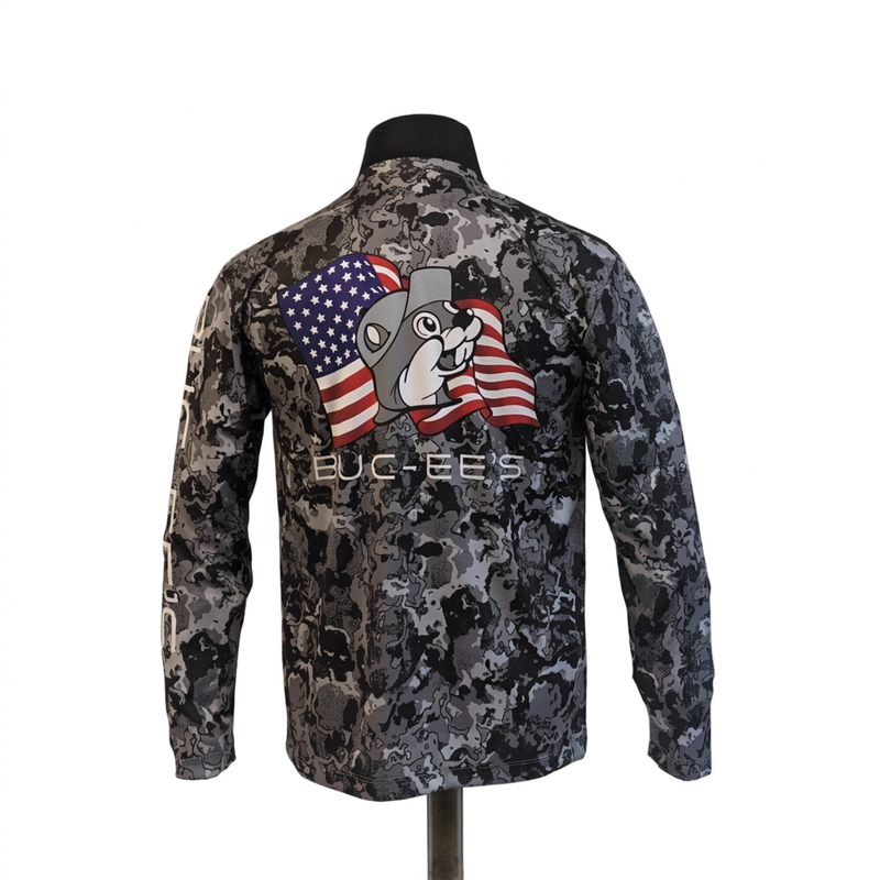 Buc-ee’s performance long sleeve shirt in gray camo with an American flag beaver back print and sleeve lettering, back view