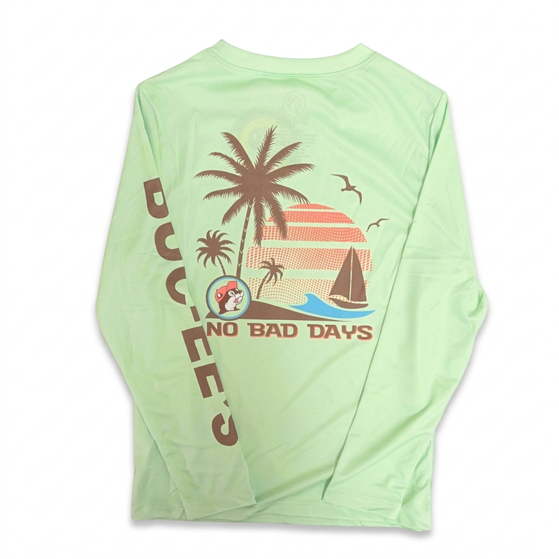 Buc-ee’s Performance Palm long-sleeve shirt in lime with No Bad Days palm tree and sailboat graphic