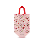 Back of the pink Buc-ee's Christmas tote with all-over Santa Buc-ee and holly print