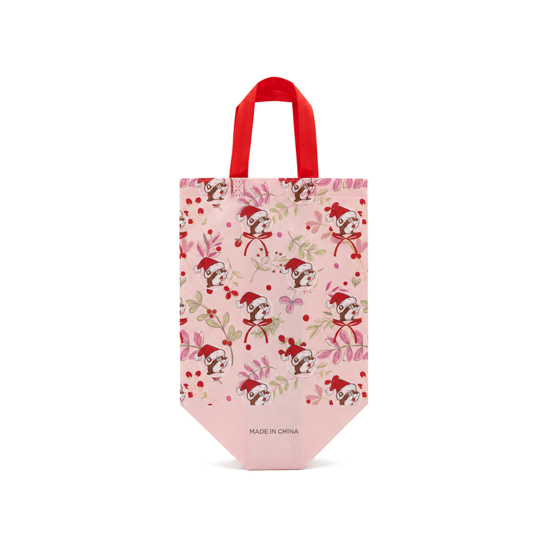 Back of the pink Buc-ee's Christmas tote with all-over Santa Buc-ee and holly print