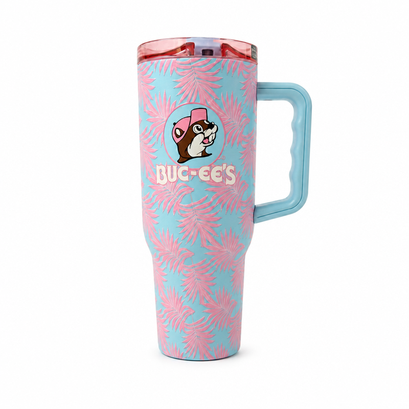 Buc-ee's pink Palm 40 oz tumbler in light blue with pink palm leaf print, beaver logo, pink lid, and handle