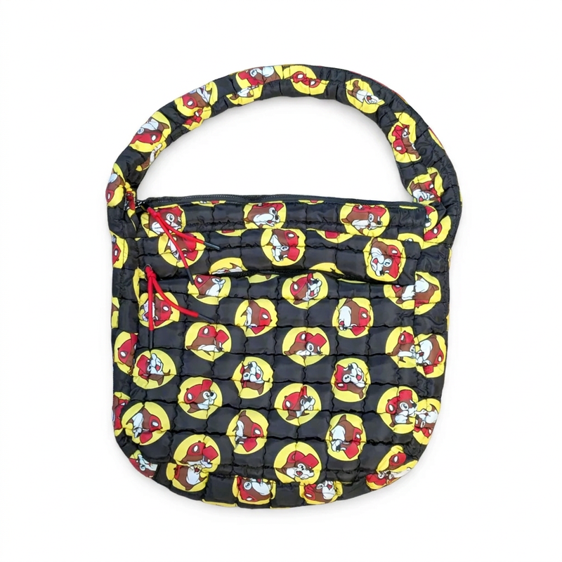 Buc-ee’s Puff Tote Bag in black quilted puffer fabric with an all-over beaver logo print and zippers with red pulls
