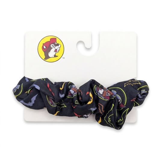 Buc-ee’s Quick Bites Spooky Nights Halloween scrunchie in black with colorful bat print, on a beaver logo hang card