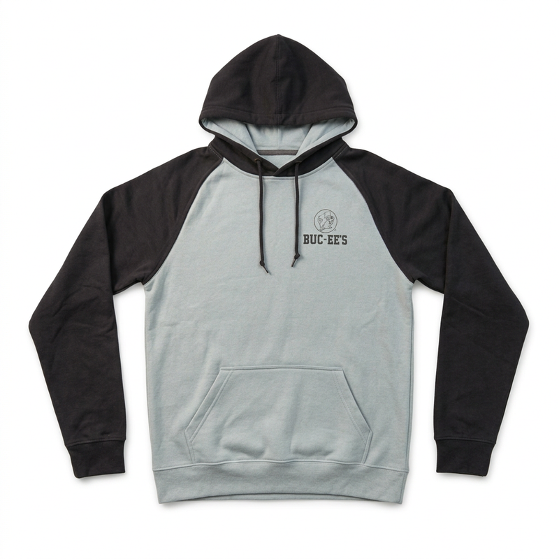 Buc-ee’s raglan pullover hoodie in light gray with black sleeves, black hood, and a small beaver chest logo