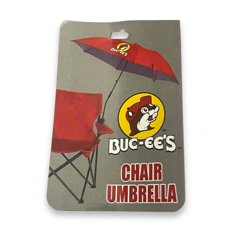 Buc-ee’s Chair Umbrella packaging showing a red umbrella with the beaver logo clamped to the arm of a red folding chair
