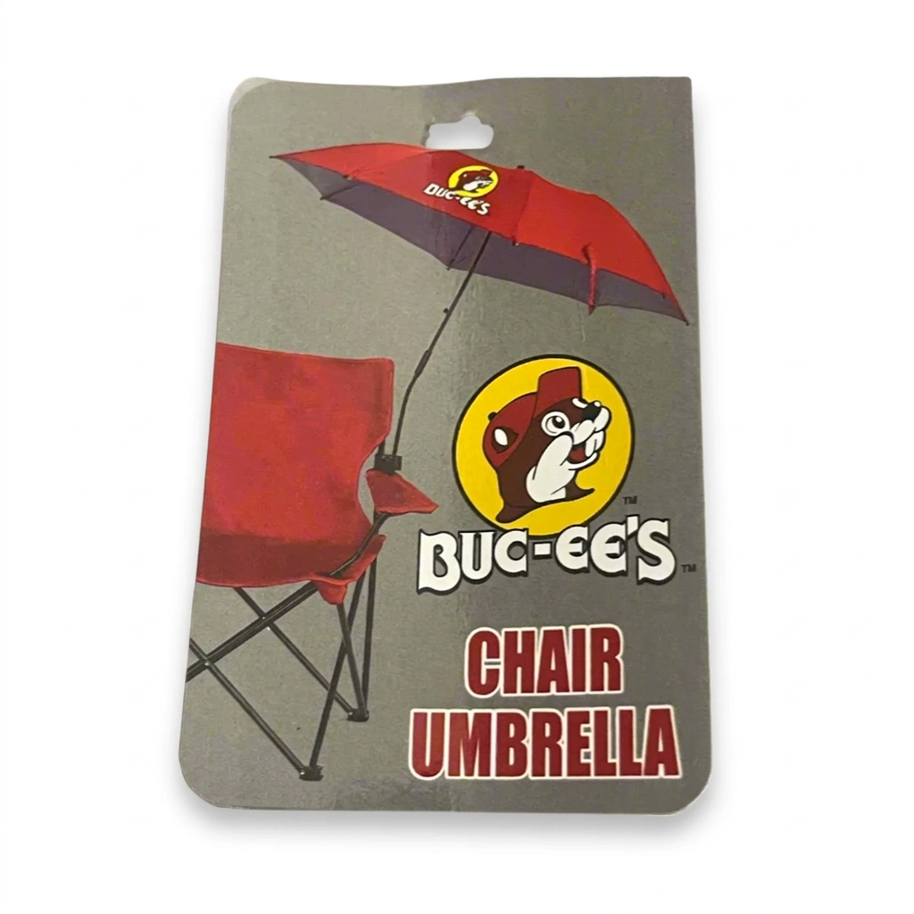 Buc-ee’s Chair Umbrella packaging showing a red umbrella with the beaver logo clamped to the arm of a red folding chair
