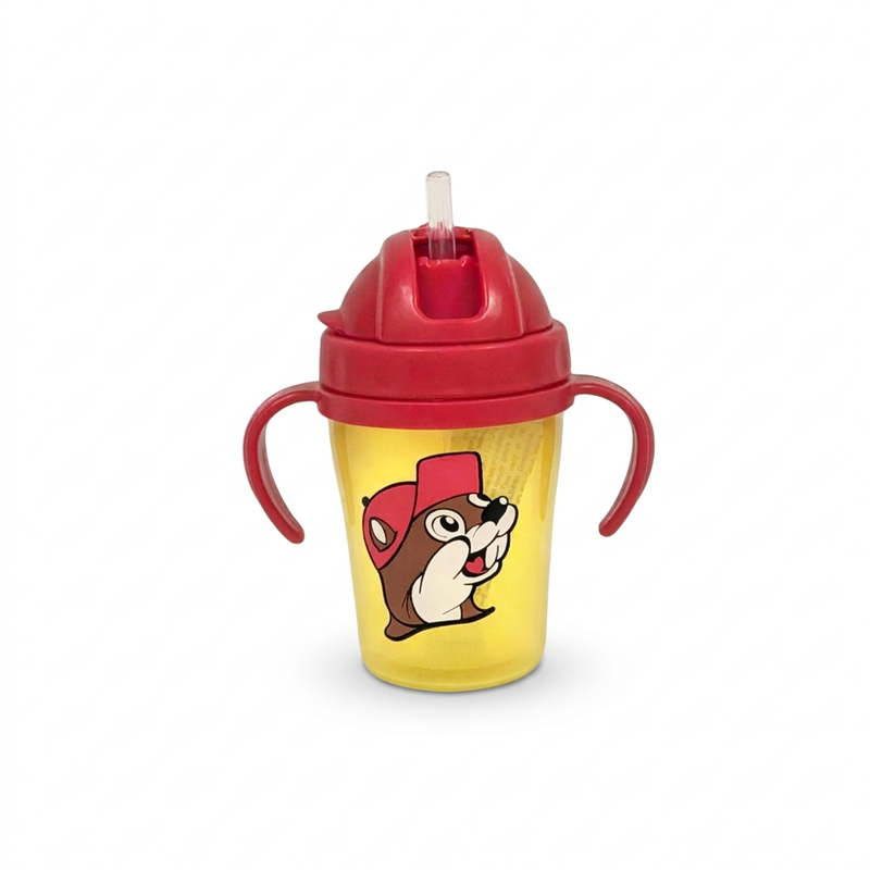 Buc-ee’s sippy cup in yellow with a red straw lid, two handles, and the beaver mascot on the front
