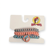 Buc-ee’s telephone cord hair ties, pink 3-pack with one coral and two speckled blue coils and a beaver logo charm