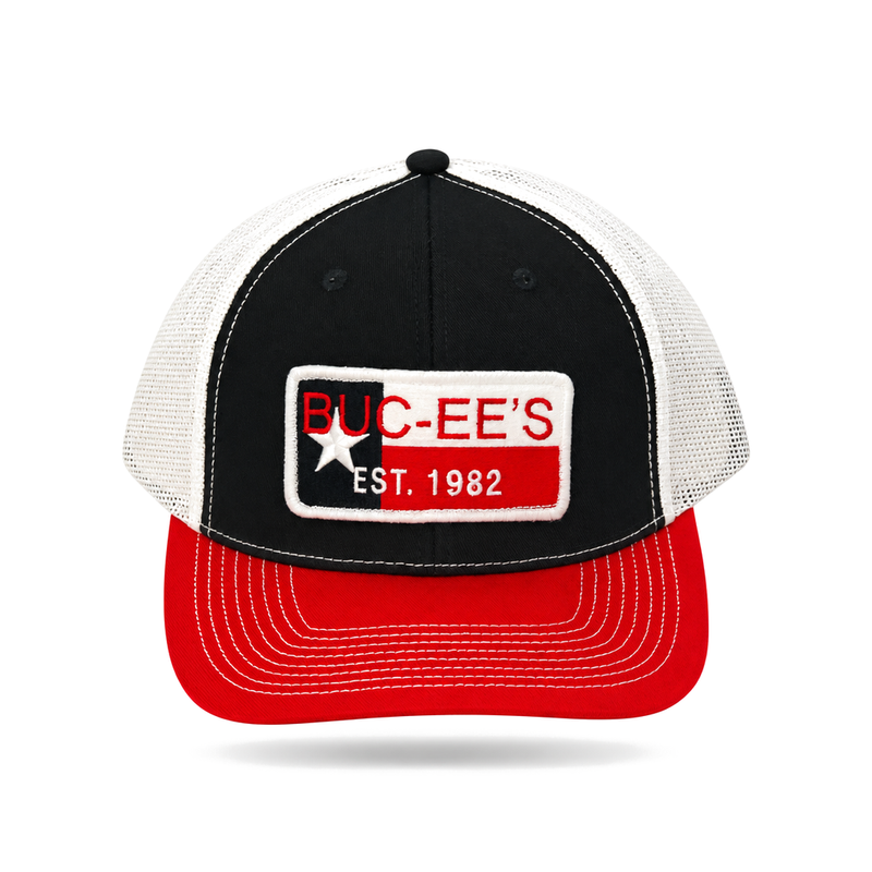 Black and white Buc-ee's trucker hat with red brim and Texas flag Est. 1982 patch